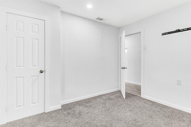 2735 Grafton Ave, Dallas, TX 75211 - unfurnished bedroom with carpet flooring and baseboards