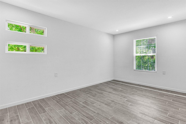 2735 Grafton Ave, Dallas, TX 75211 - empty room featuring wood finished floors and recessed lighting