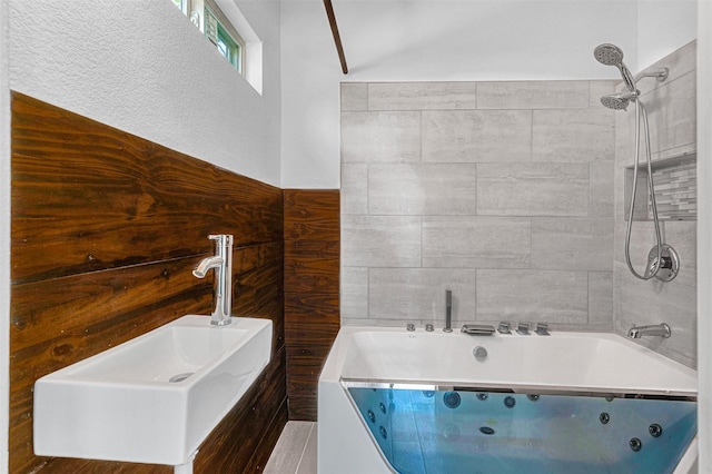 2735 Grafton Ave, Dallas, TX 75211 - bathroom with a sink and a combined bath / shower with jetted tub