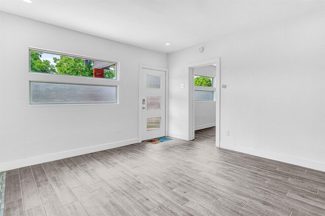 2735 Grafton Ave, Dallas, TX 75211 - unfurnished room featuring wood finished floors and recessed lighting