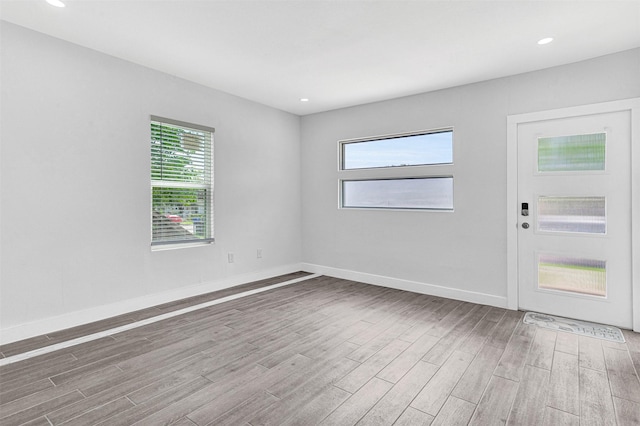 2735 Grafton Ave, Dallas, TX 75211 - unfurnished room featuring wood finished floors and recessed lighting