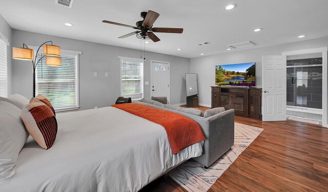 1835 Fort Graham Rd, Waco, TX 76705 - bedroom featuring wood finished floors, recessed lighting, ceiling fan, and attic access