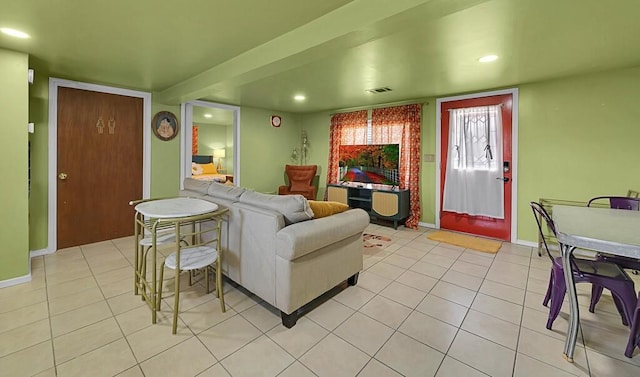 1835 Fort Graham Rd, Waco, TX 76705 - living room featuring light tile patterned floors, recessed lighting, and baseboards