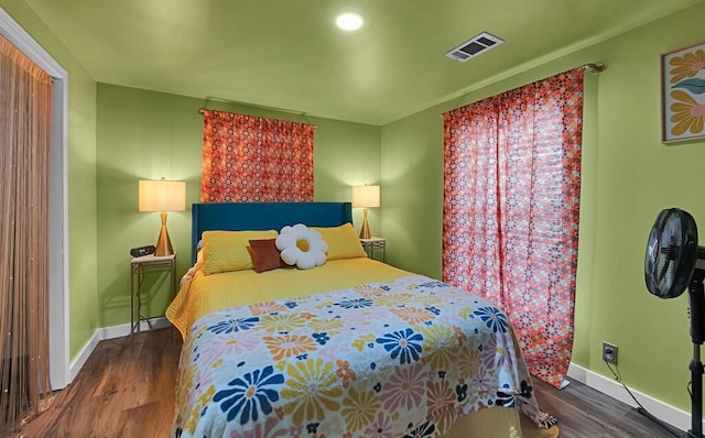 1835 Fort Graham Rd, Waco, TX 76705 - bedroom with wood finished floors and baseboards