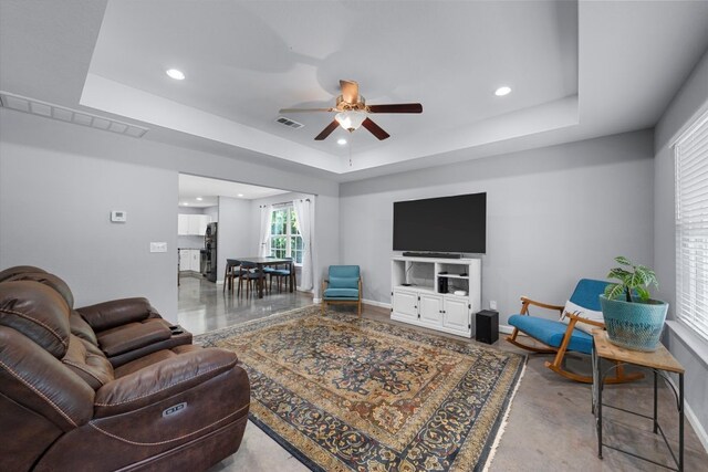 2915 Ethel Ave, Waco, TX 76707 - living area featuring a ceiling fan, a raised ceiling, baseboards, and recessed lighting