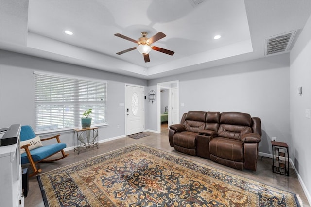 2915 Ethel Ave, Waco, TX 76707 - living room with a tray ceiling, a ceiling fan, baseboards, and recessed lighting