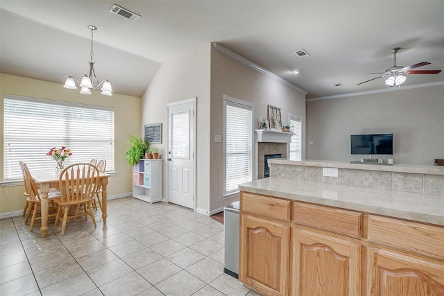 320 Westgate Dr, Aledo, TX 76008 - kitchen with baseboards, a tiled fireplace, a ceiling fan, light countertops, and a chandelier