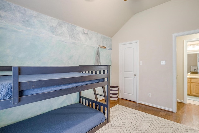 320 Westgate Dr, Aledo, TX 76008 - bedroom with wood finished floors, vaulted ceiling, and baseboards