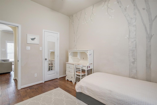 320 Westgate Dr, Aledo, TX 76008 - bedroom with arched walkways, wood finished floors, and baseboards