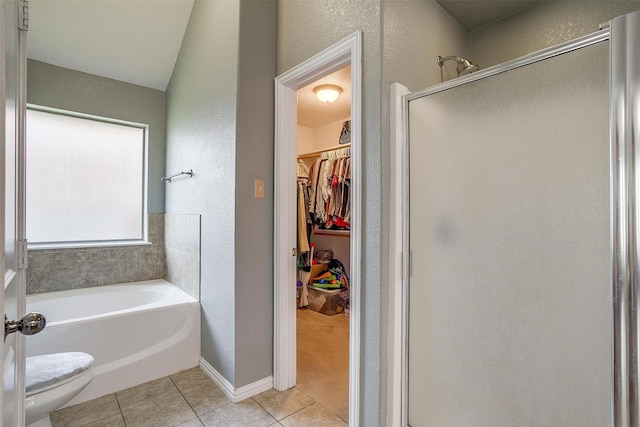 320 Westgate Dr, Aledo, TX 76008 - bathroom with tile patterned flooring, a shower stall, toilet, a walk in closet, and a textured wall