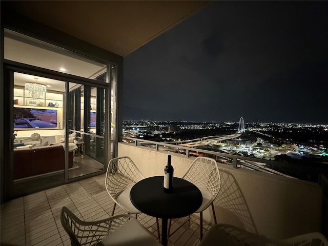 2200 Victory Ave Unit 2306, Dallas, TX 75219 - view of balcony at twilight