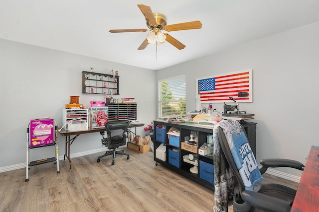 2344 Magnolia Dr, Little Elm, TX 75068 - home office with wood finished floors, a ceiling fan, and baseboards