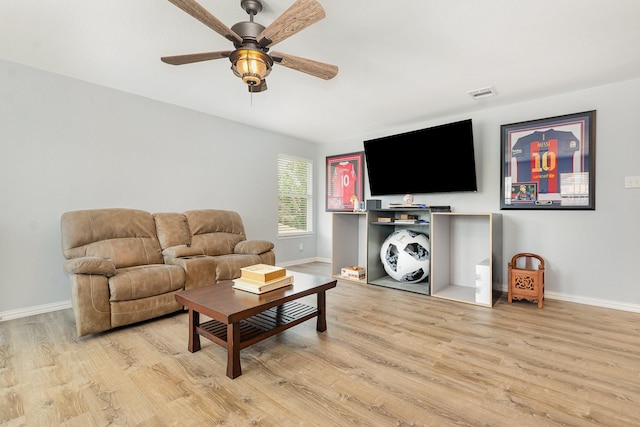 2344 Magnolia Dr, Little Elm, TX 75068 - living area with light wood-style flooring, baseboards, and ceiling fan