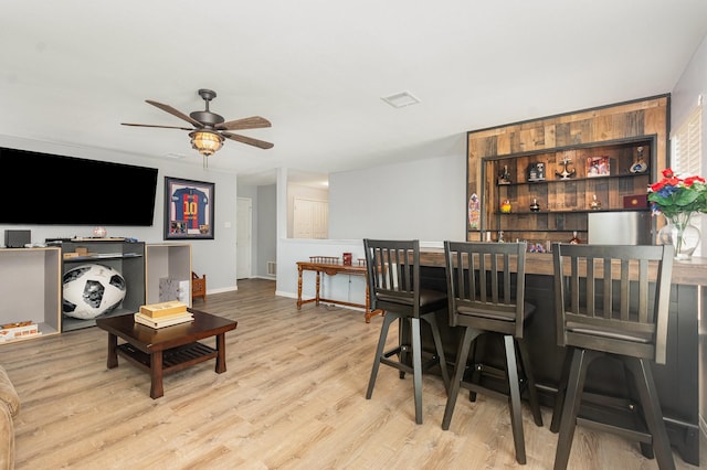 2344 Magnolia Dr, Little Elm, TX 75068 - dining room with wood finished floors, ceiling fan, and baseboards
