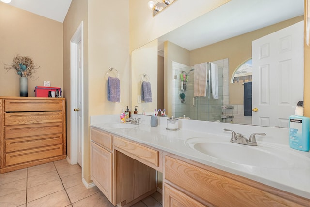 2344 Magnolia Dr, Little Elm, TX 75068 - full bathroom featuring a shower stall, double vanity, and tile patterned flooring