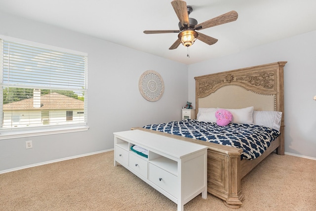 2344 Magnolia Dr, Little Elm, TX 75068 - bedroom with light carpet, baseboards, and ceiling fan