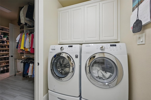 415 Fountainview Dr, Irving, TX 75039 - laundry area with washer and clothes dryer and cabinet space