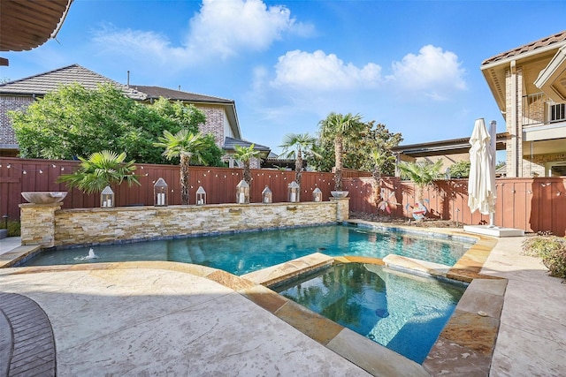 415 Fountainview Dr, Irving, TX 75039 - view of swimming pool featuring a fenced backyard, a pool with connected hot tub, and a patio