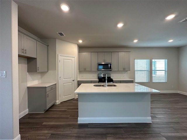 123 Monarch Way, Wylie, TX 75098 - kitchen featuring gray cabinets, stainless steel appliances, baseboards, and recessed lighting