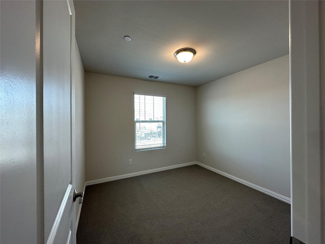 123 Monarch Way, Wylie, TX 75098 - unfurnished room featuring dark carpet and baseboards