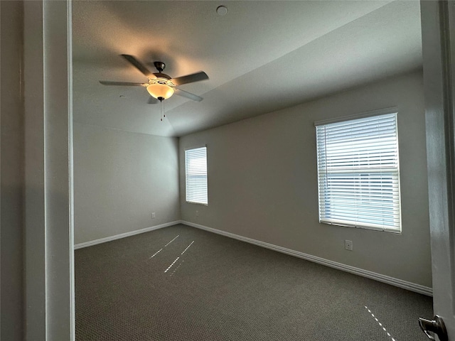 123 Monarch Way, Wylie, TX 75098 - empty room with dark colored carpet, baseboards, and ceiling fan