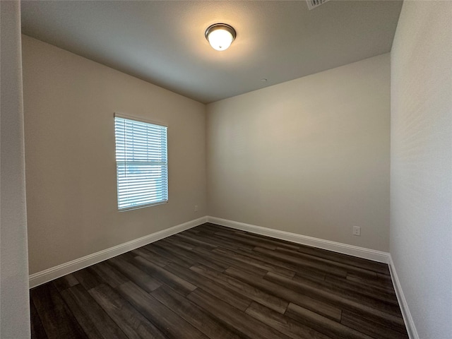 123 Monarch Way, Wylie, TX 75098 - unfurnished room featuring dark wood-style flooring and baseboards