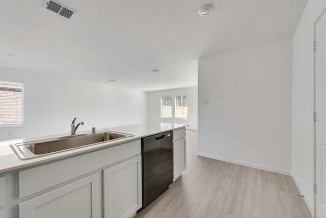 1937 Kiwi Dr, Royse City, TX 75189 - kitchen featuring dishwasher, a sink, light wood-style flooring, light countertops, and baseboards
