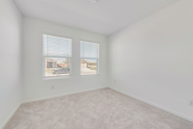 1937 Kiwi Dr, Royse City, TX 75189 - spare room with light colored carpet and baseboards