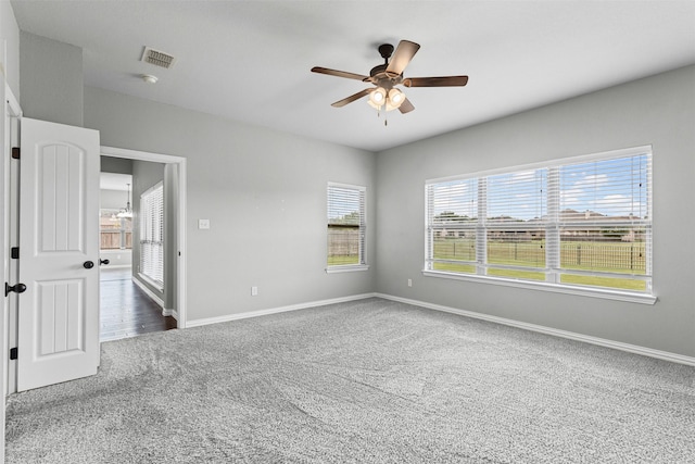 1028 Morningside Dr, Burleson, TX 76028 - spare room with carpet floors, a ceiling fan, and baseboards