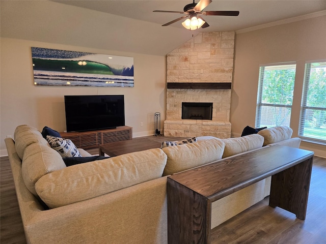 632 Yucca Ct, Aledo, TX 76008 - living room with ceiling fan, dark wood-style flooring, a stone fireplace, lofted ceiling, and ornamental molding