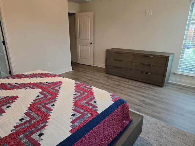 632 Yucca Ct, Aledo, TX 76008 - bedroom with baseboards and wood finished floors