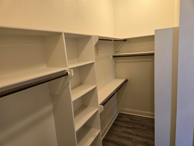632 Yucca Ct, Aledo, TX 76008 - walk in closet featuring dark wood-style flooring
