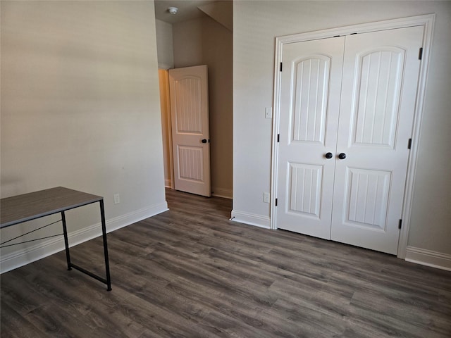 632 Yucca Ct, Aledo, TX 76008 - unfurnished bedroom with dark wood-style floors, baseboards, and a closet