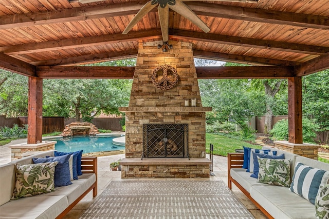 104 Crestwood Dr, Fort Worth, TX 76107 - fenced backyard with an outdoor living space with a fireplace, a patio area, a gazebo, and ceiling fan