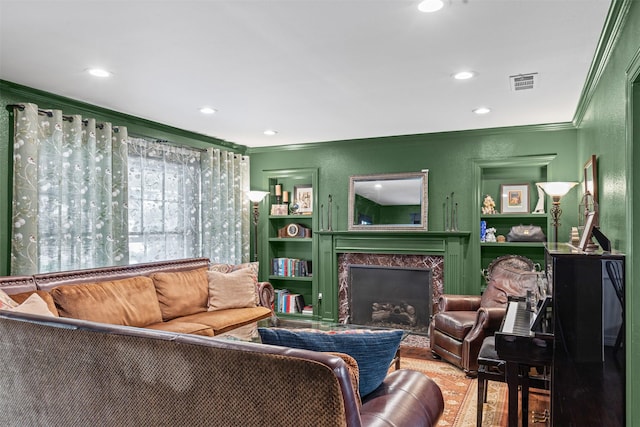 104 Crestwood Dr, Fort Worth, TX 76107 - living area with ornamental molding, a high end fireplace, and recessed lighting
