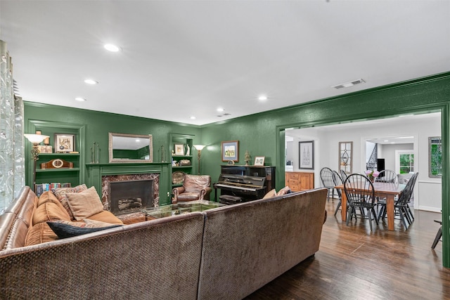 104 Crestwood Dr, Fort Worth, TX 76107 - living area featuring a fireplace, recessed lighting, dark wood finished floors, and crown molding