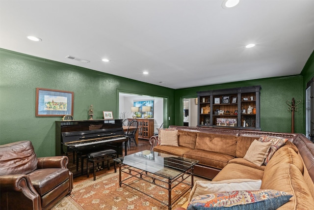 104 Crestwood Dr, Fort Worth, TX 76107 - living room with a textured wall, ornamental molding, recessed lighting, and wood finished floors
