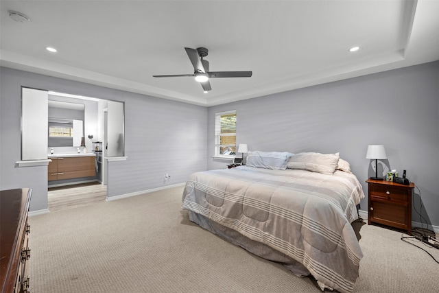 10916 Ferndale Rd, Dallas, TX 75238 - bedroom with baseboards, light carpet, a tray ceiling, recessed lighting, and a ceiling fan