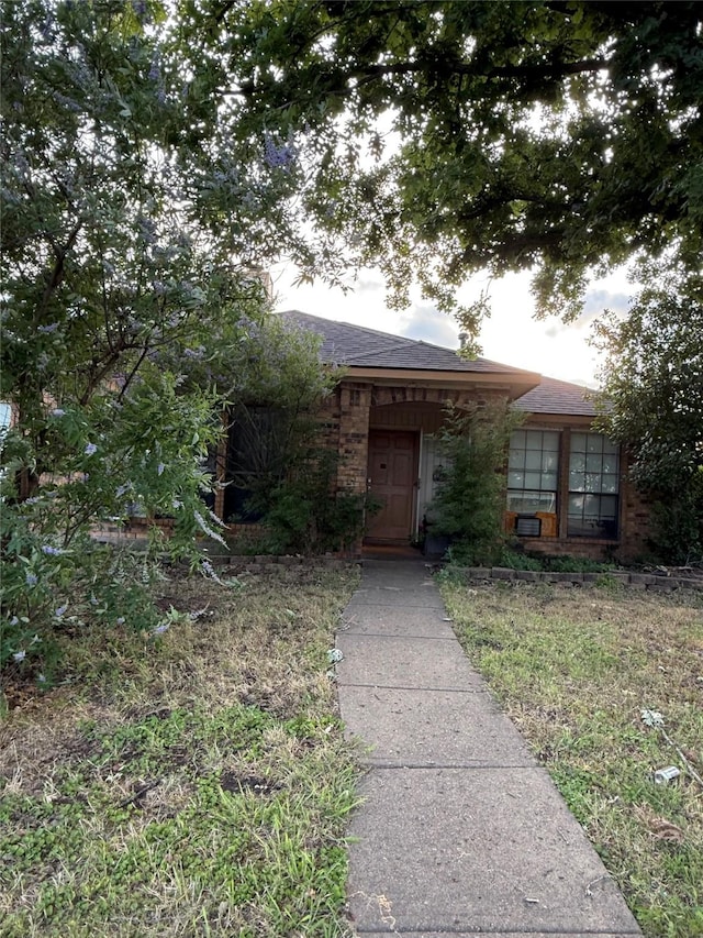 801 Micarta Dr, Mesquite, TX 75181 - view of front of home featuring roof with shingles