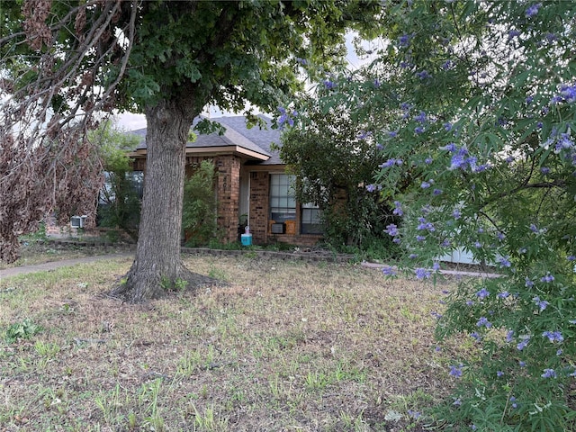 801 Micarta Dr, Mesquite, TX 75181 - view of front of property featuring brick siding and a shingled roof