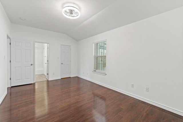 6622 Victoria Ave, Dallas, TX 75209 - unfurnished bedroom with baseboards, lofted ceiling, wood finished floors, and ensuite bath
