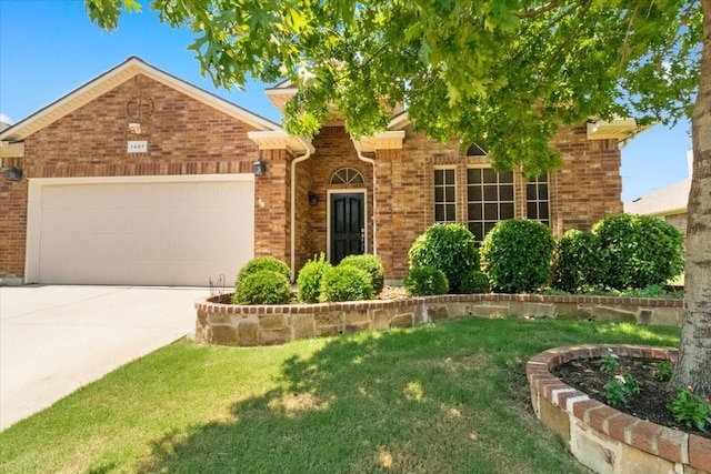 1407 Deer Hollow Dr, Arlington, TX 76002 - traditional-style house featuring a garage, a front lawn, driveway, and brick siding