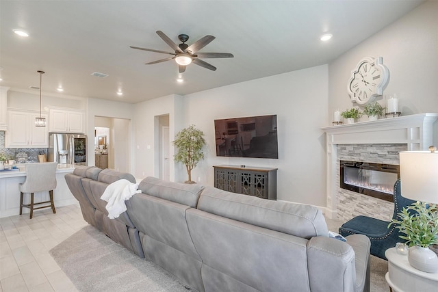 1733 Reverie Rd, Burleson, TX 76028 - living room with ceiling fan, recessed lighting, and a stone fireplace