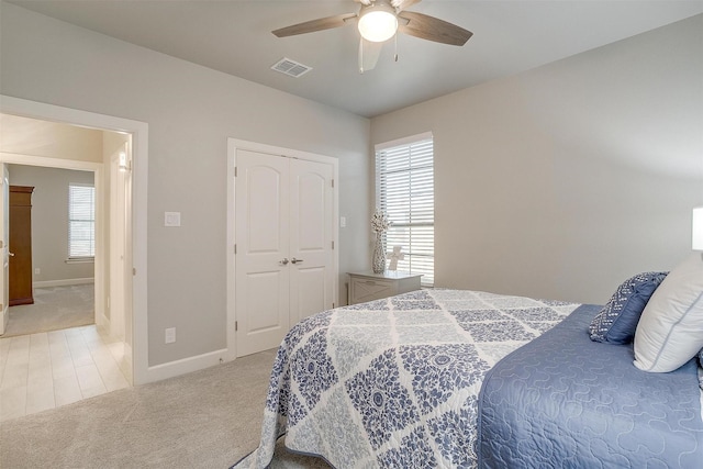 1733 Reverie Rd, Burleson, TX 76028 - carpeted bedroom featuring ceiling fan and a closet