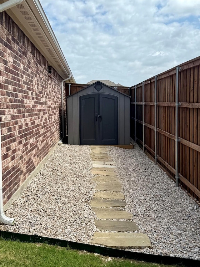 1733 Reverie Rd, Burleson, TX 76028 - fenced backyard featuring a storage shed