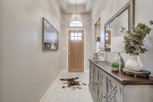 1733 Reverie Rd, Burleson, TX 76028 - entrance foyer with a chandelier and baseboards