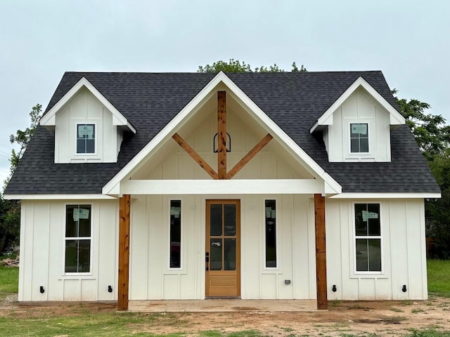 301 S Oak St, Boyd, TX 76023 - modern farmhouse style home with board and batten siding, a shingled roof, and covered porch