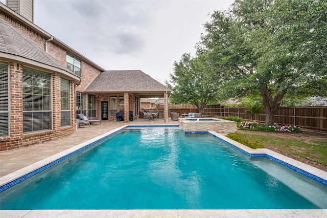 590 Willow Ridge Cir, Prosper, TX 75078 - view of pool featuring a patio area, an in-ground hot tub, and a fenced backyard
