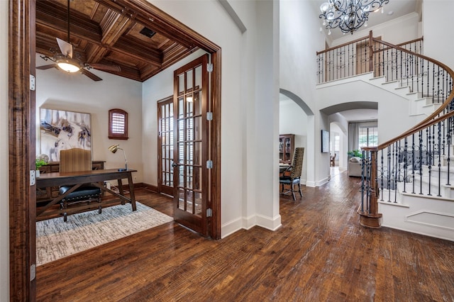 590 Willow Ridge Cir, Prosper, TX 75078 - entryway featuring arched walkways, hardwood / wood-style floors, ceiling fan, baseboards, and stairs