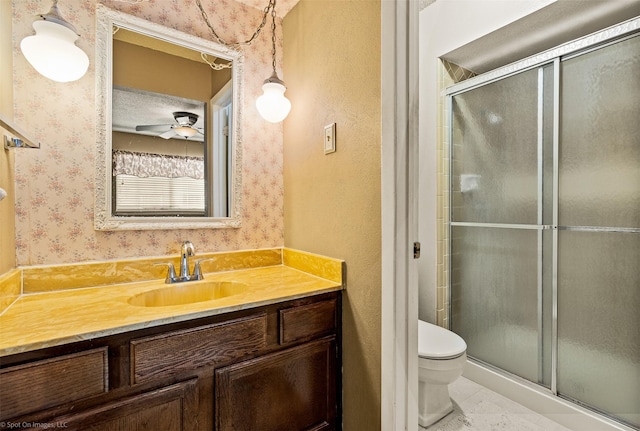 1710 Goliad Dr, Garland, TX 75042 - full bath with vanity, toilet, a stall shower, and wallpapered walls